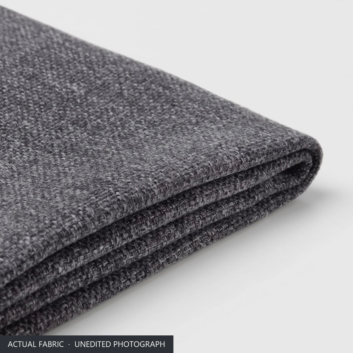 Close-up of the graphite grey melange stretch-woven polyester of the Bergmund cover