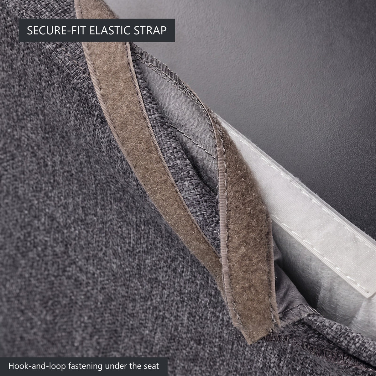 Elastic corner strap and hook-and-loop under the seat of the grey Bergmund chair cover