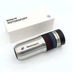 Stainless steel BMW travel mug in front of its BMW M Motorsport presentation box