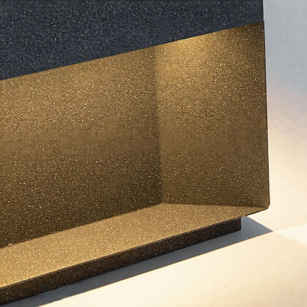 Close-up of the textured light panel glowing beneath the pillar light's overhanging top