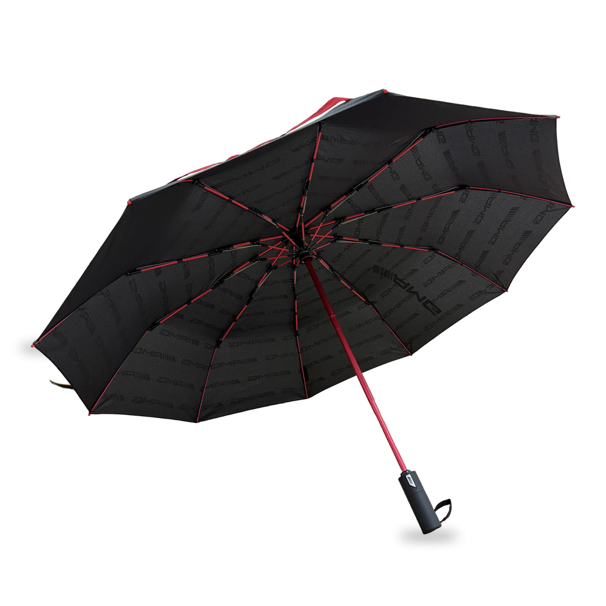 Mercedes-AMG windproof compact umbrella open, black canopy with tonal AMG print, red fibreglass-reinforced ribs, steel shaft