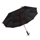 Mercedes-AMG windproof compact umbrella open, black canopy with tonal AMG print, red fibreglass-reinforced ribs, steel shaft