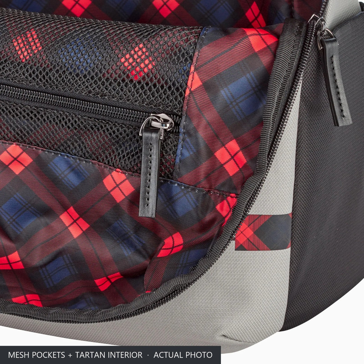 Mesh organiser pockets and tartan interior of the Porsche laptop rucksack with the zip open