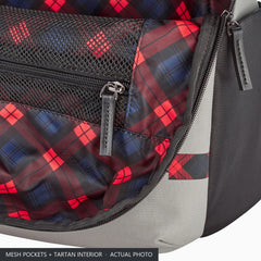 Mesh organiser pockets and tartan interior of the Porsche laptop rucksack with the zip open