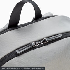 Water-repellent grey nylon and twin zip pullers on top of the Porsche Turbo No. 1 backpack