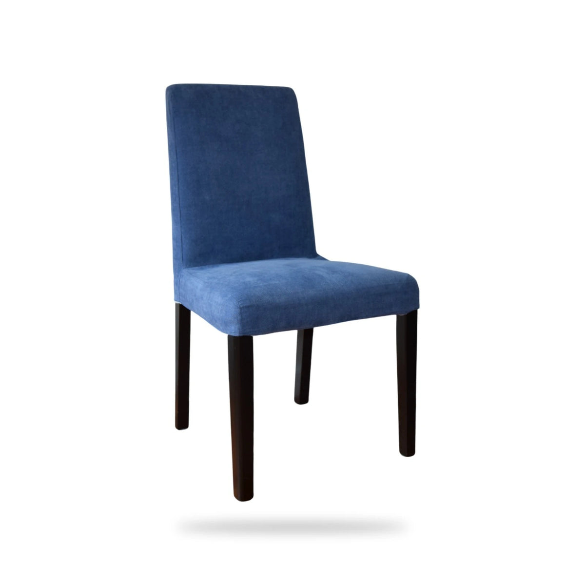 Denim blue IKEA Bergmund dining chair cover fitted on the chair, front three-quarter view