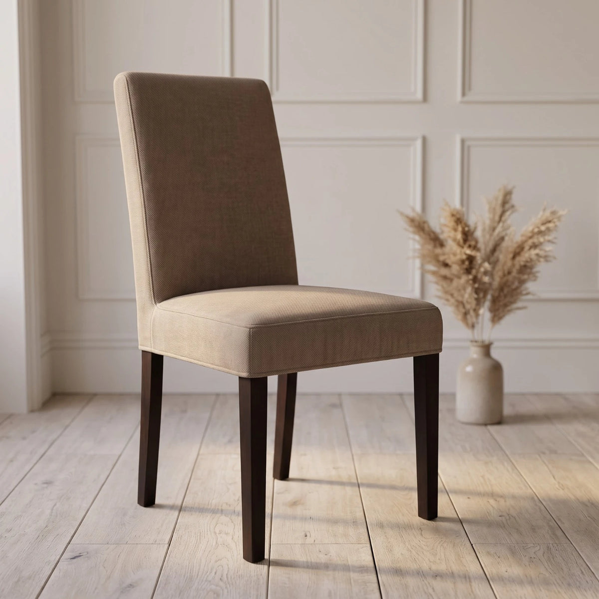 Taupe Bergmund chair cover in soft polycotton on a dining chair in a panelled room