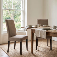 IKEA Bergmund chairs in beige taupe replacement covers at a farmhouse dining table